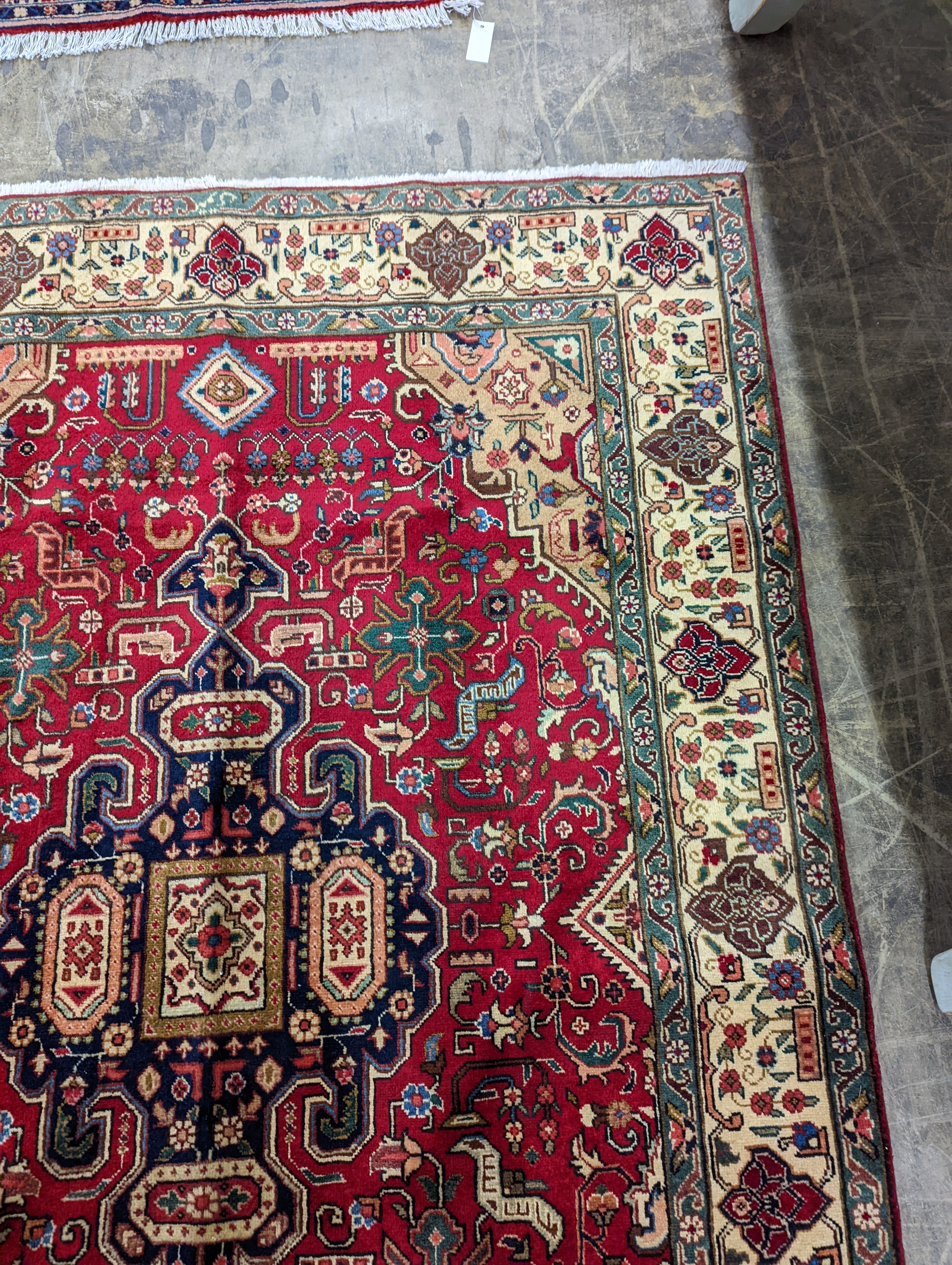 A Tabriz rug, 190 x 137cm